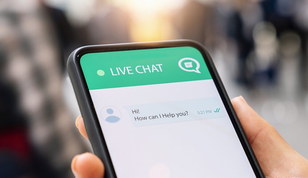 A smartphone displaying a live chat screen in an e-commerce setting, aiming to enhance customer support and engagement.