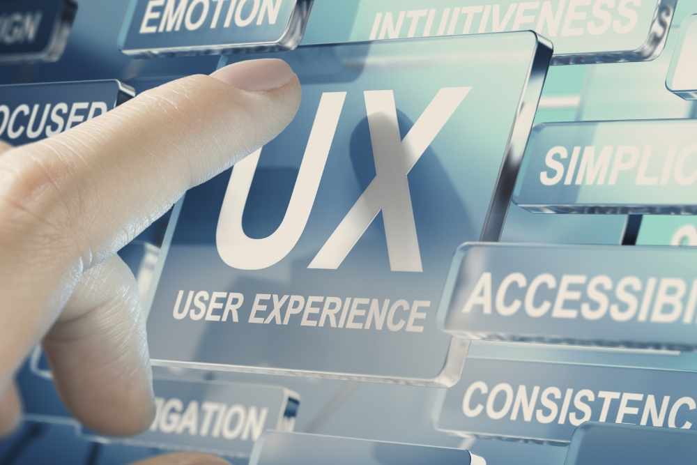 A hand interacts with a transparent digital interface featuring the text "UX USER EXPERIENCE", highlighting the various elements that contribute to an optimal AI user experience.