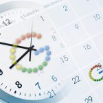 Clock overlayed on a calendar symbolising time-based ad scheduling for Google Ads optimisation.