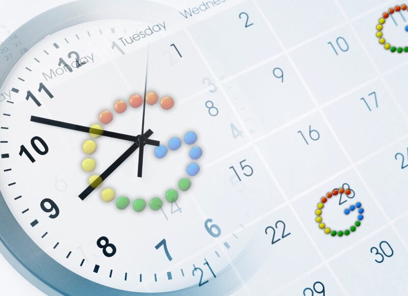 Clock overlayed on a calendar symbolising time-based ad scheduling for Google Ads optimisation.