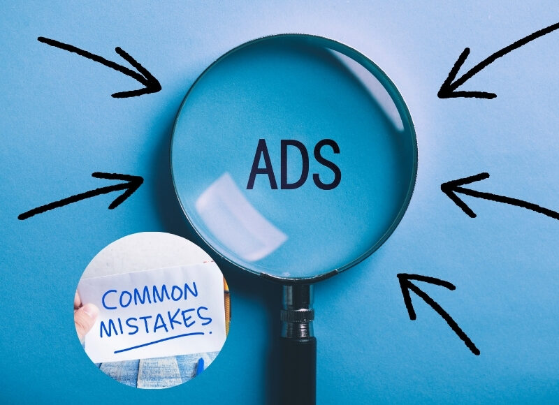 A magnifying glass focuses on the word "ADS" with arrows pointing to it. A hand holds a sign that says "COMMON MISTAKES".