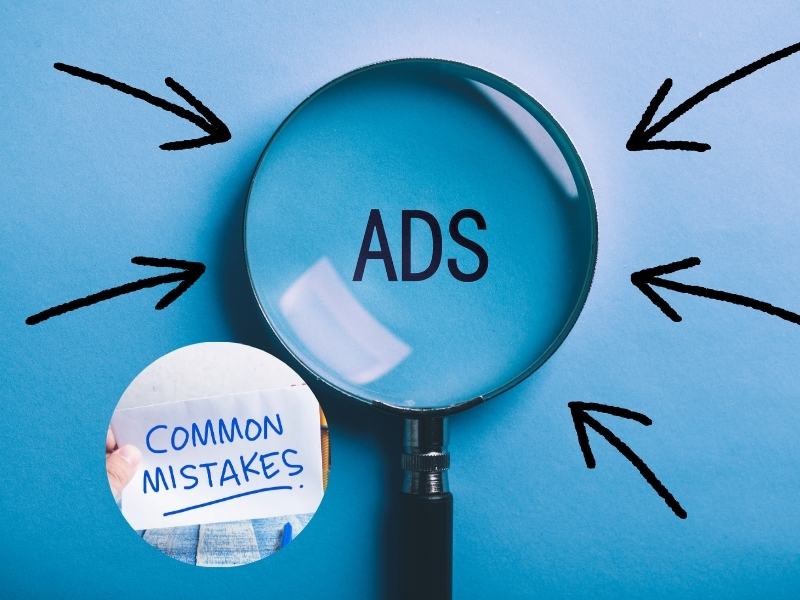 A magnifying glass focuses on the word "ADS" with arrows pointing to it. A hand holds a sign that says "COMMON MISTAKES".