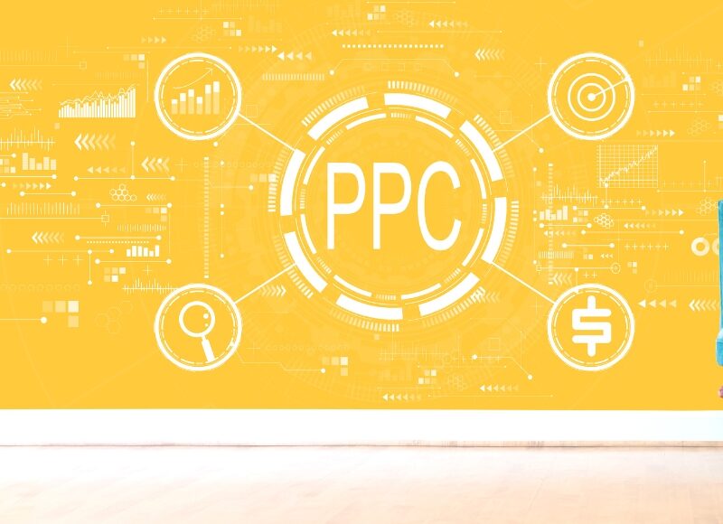 A yellow background with "PPC" in the centre, surrounded by digital marketing icons, representing PPC e-commerce effectiveness.