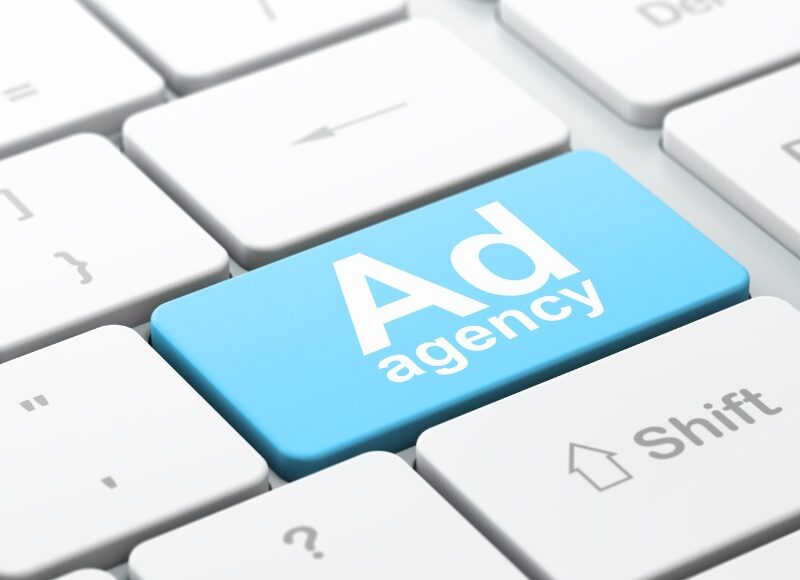 Best google ads agencies concept keyboard button for online advertising services.