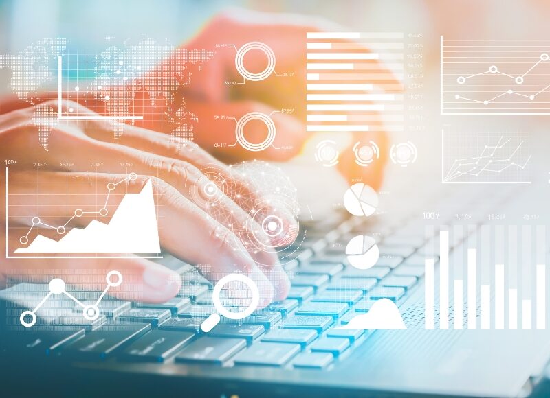 Hands managing digital campaign metrics, reflecting data-led decisions by a local Google Ads agency