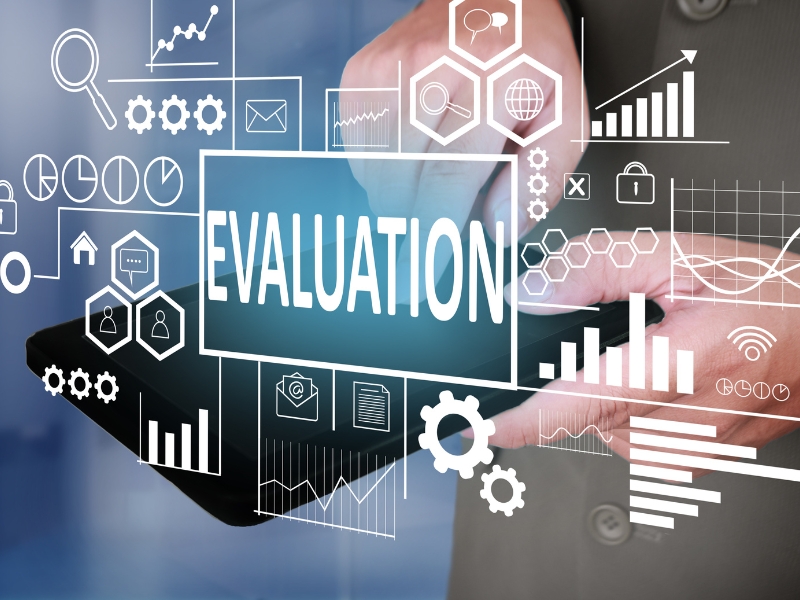 google ppc expert evaluating digital marketing performance on tablet with data charts and analytics icons overlay