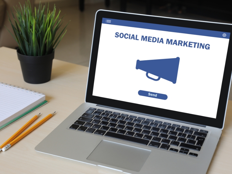 Top social media marketing agencies promoting digital campaigns through laptop screen.