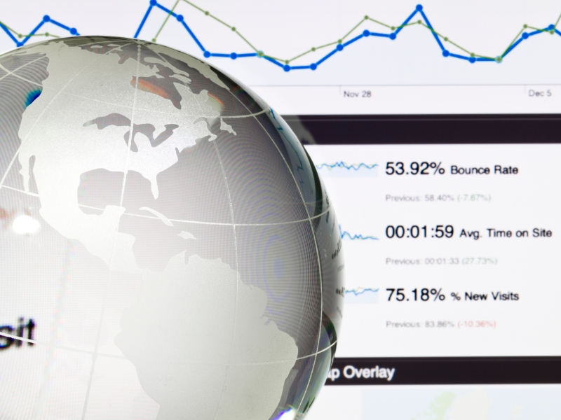 Google Ads Management Agency analyzing bounce rate and traffic metrics on digital dashboard.
