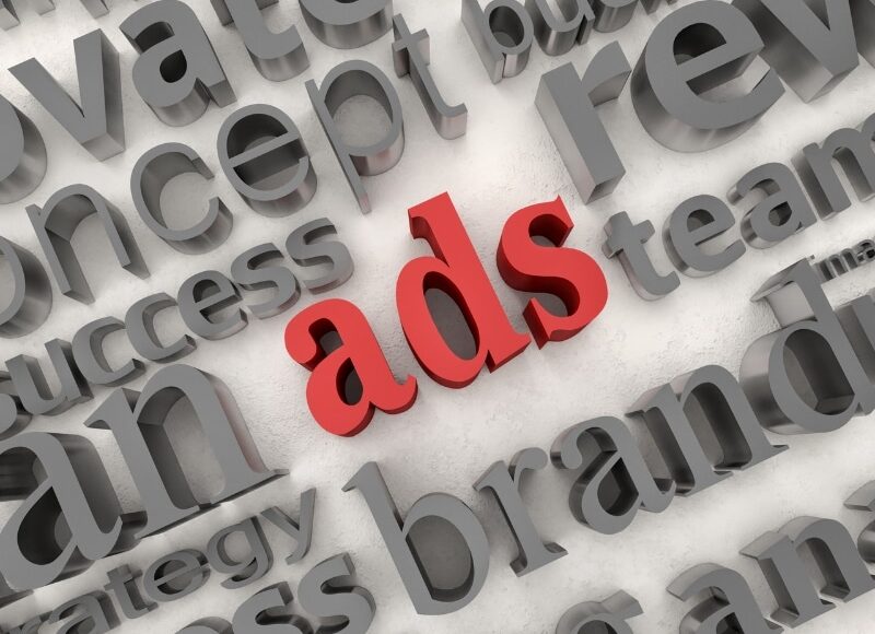 3D grey marketing words with the red word “ads” highlighted in the centre, illustrating ad management service concepts.