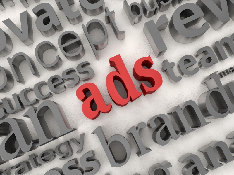 3D grey marketing words with the red word “ads” highlighted in the centre, illustrating ad management service concepts.