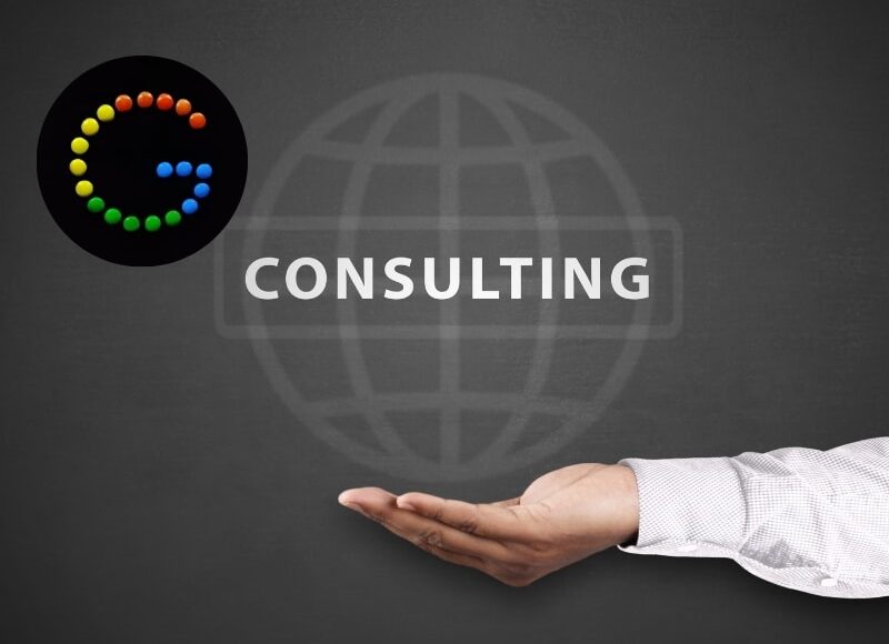 Hand presenting a digital consulting graphic with a colourful Google-style icon, representing google ads consulting services.