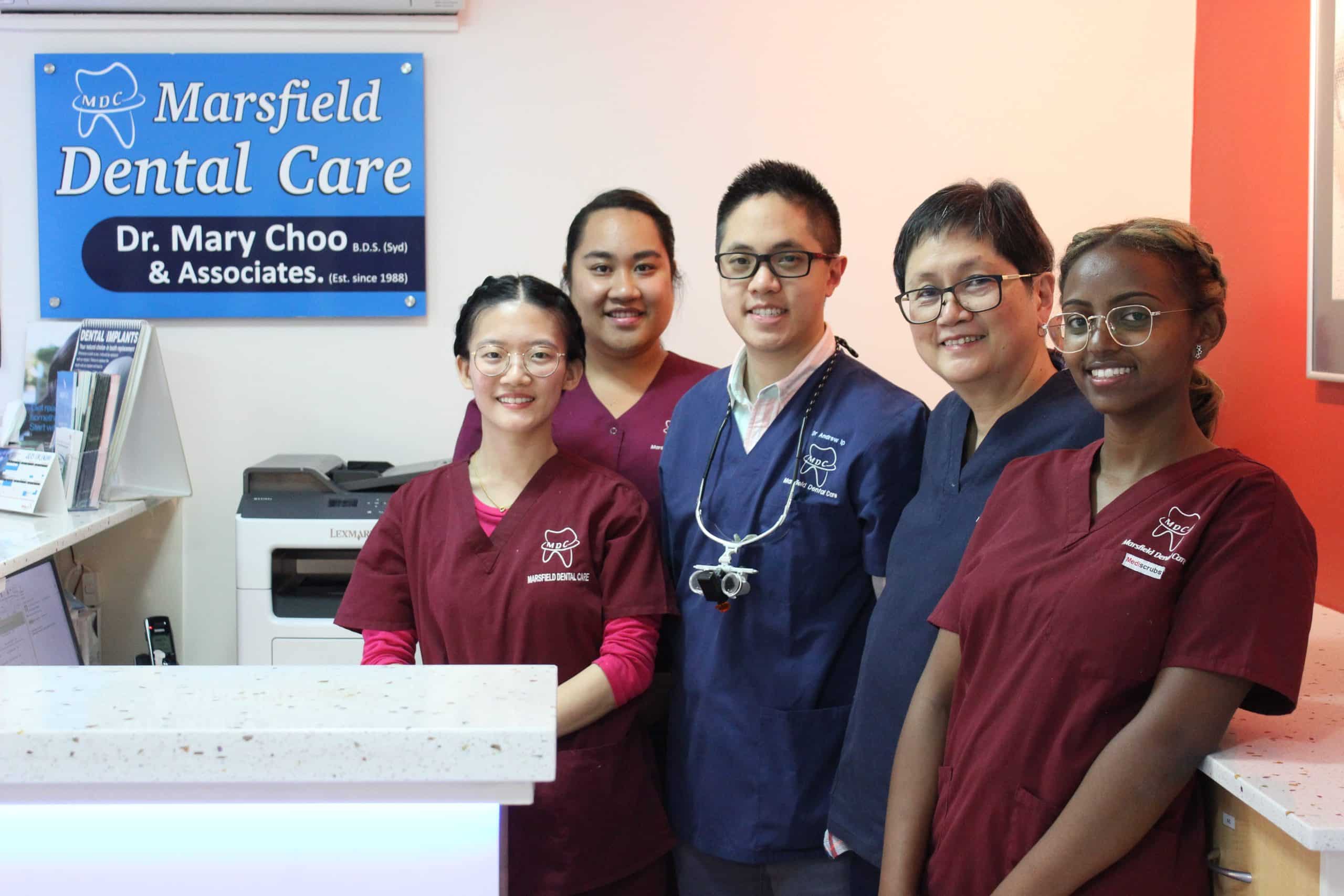 Marsfield Dental Care team standing at reception inside their Sydney dental clinic
